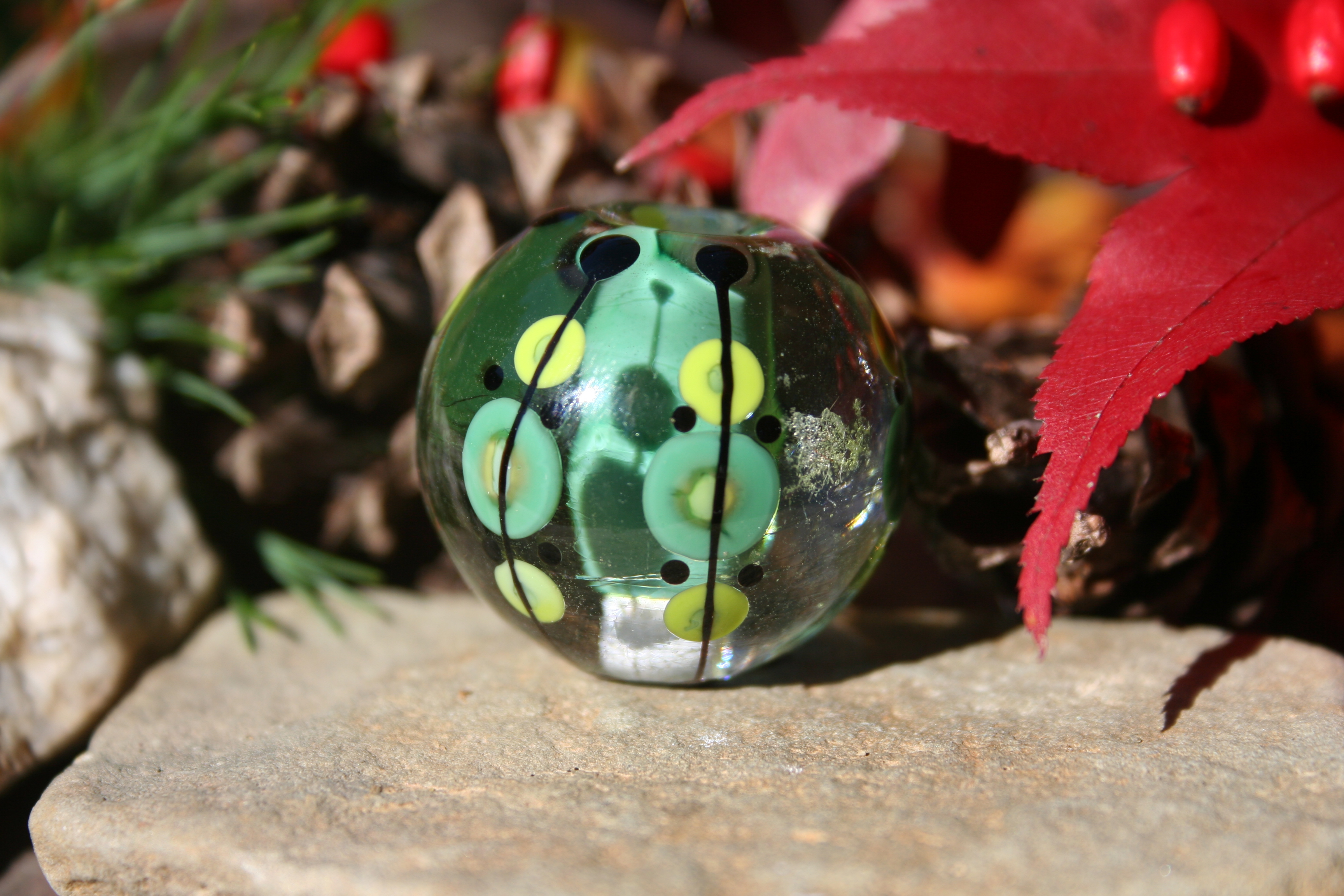 glass bead-green geometric-