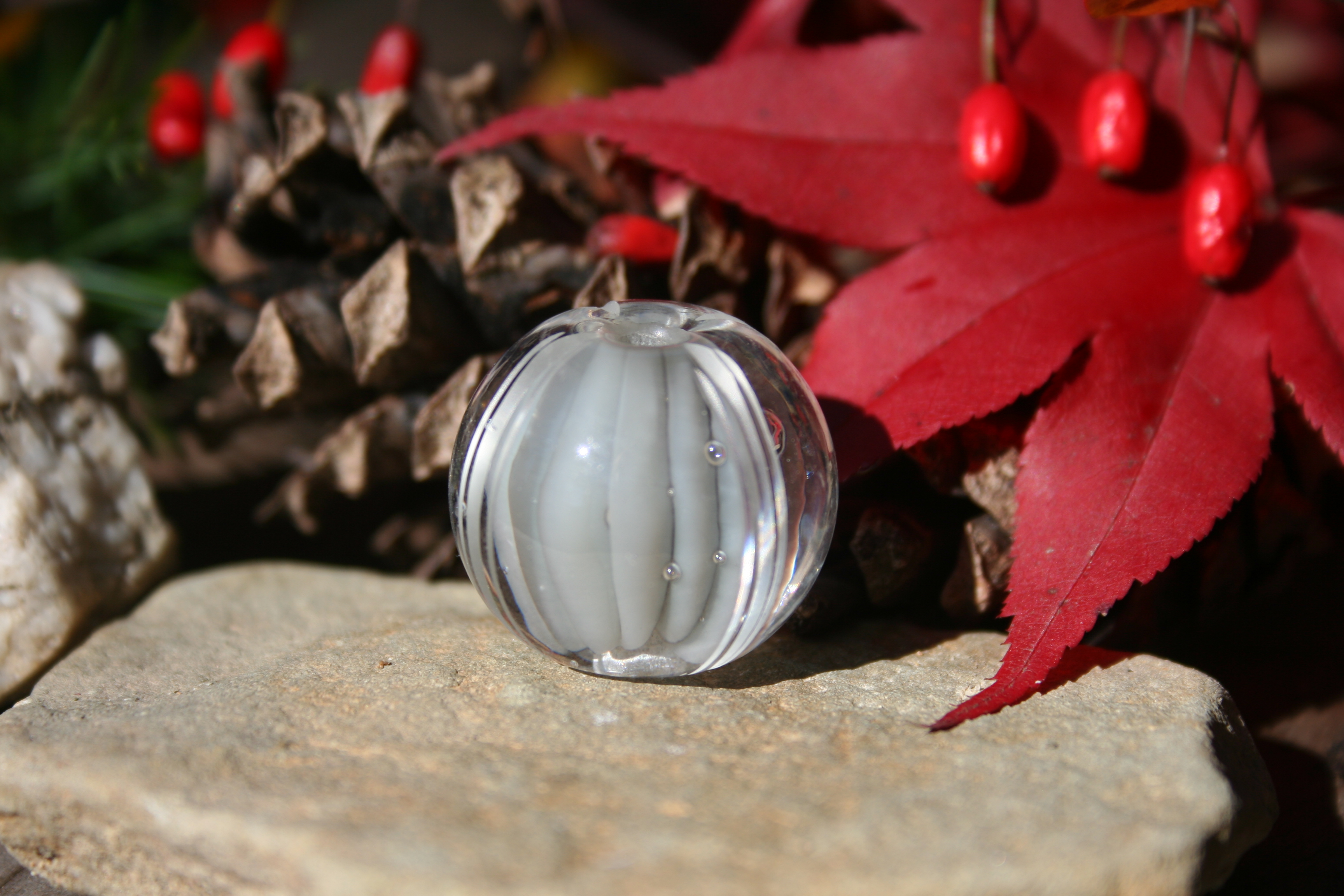glass bead-light grey carved